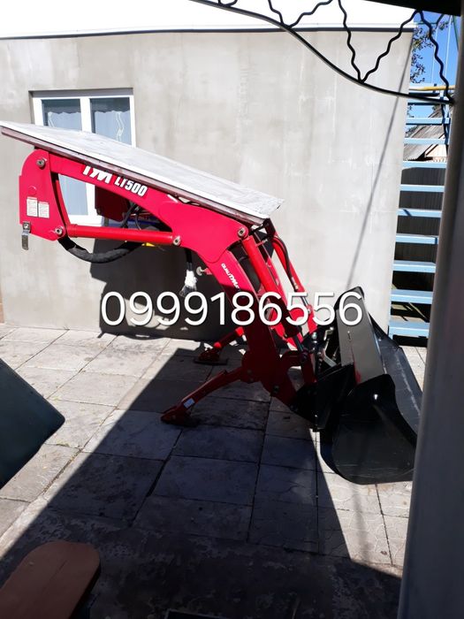 Навантажувач фронтальный.