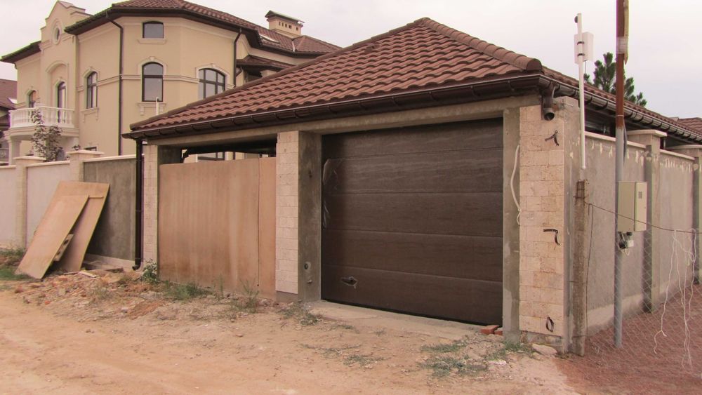 Ворота гаражні,ролети, Решітки ролетні  посилені, автоматика. Компанія