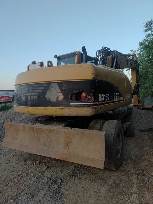 Koparka kołowa CAT313 / CAT315