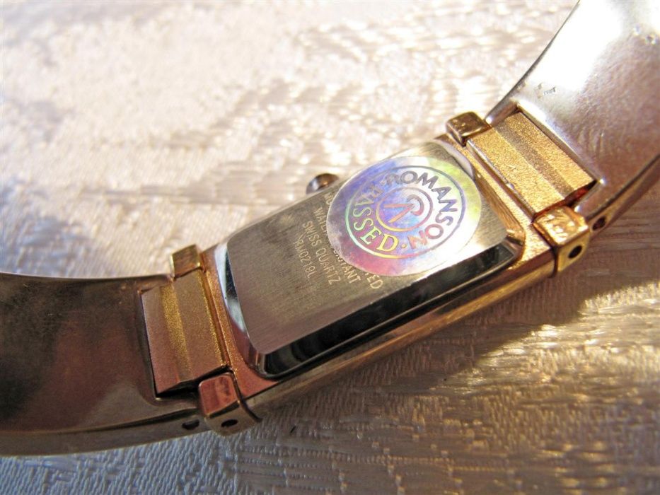 Часы женские кварцевые "ROMANSON RM 0219L", новые