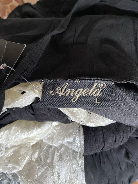 Nowa czarna sukienka z białą koronkową wstawką elegancka