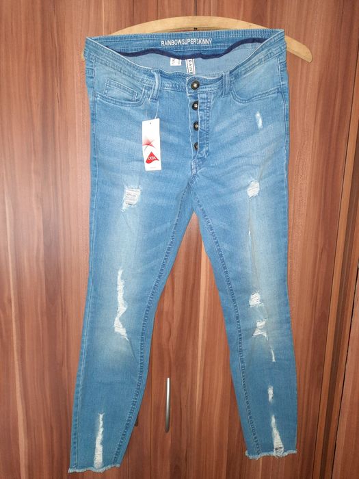 Spodnie jeansowe skiny z dziurami rurki jeansy