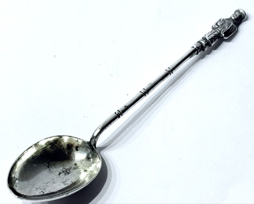 Antiga colher figurativa asiática em prata contrastada