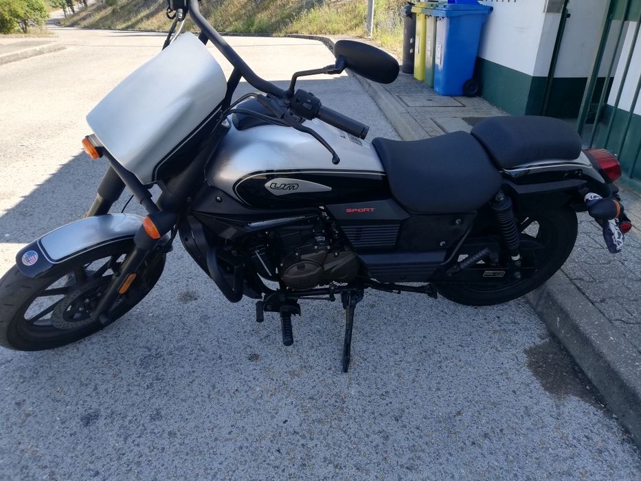 UM  RENEGADE sport 125cc.     Venda/troca