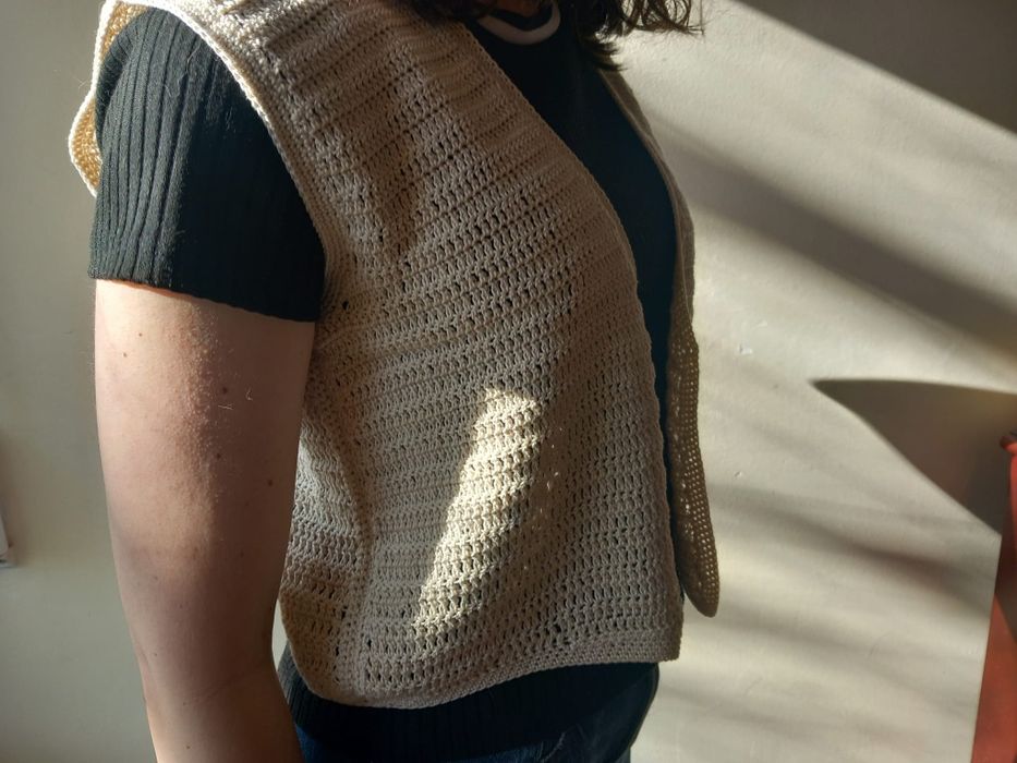 Colete de malha em algodão.