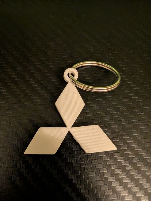 Brelok Mitsubishi do auta biały 3D