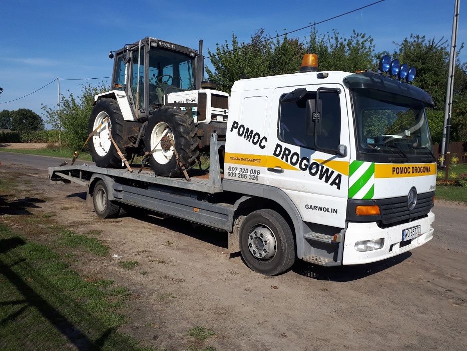 Pomoc drogowa transport kombajnów wózków maszyn laweta traktorów lkt