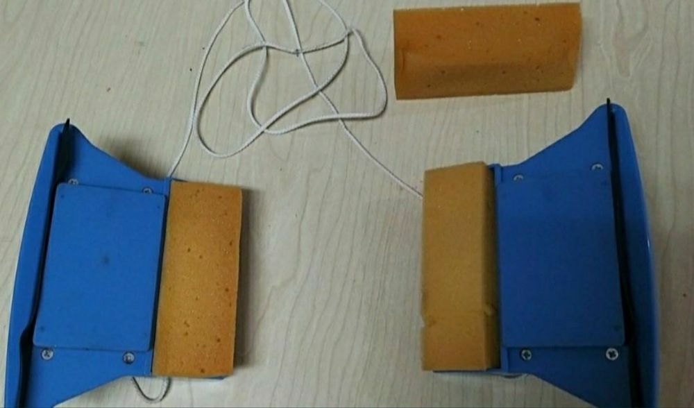 Limpa vidros magnético.