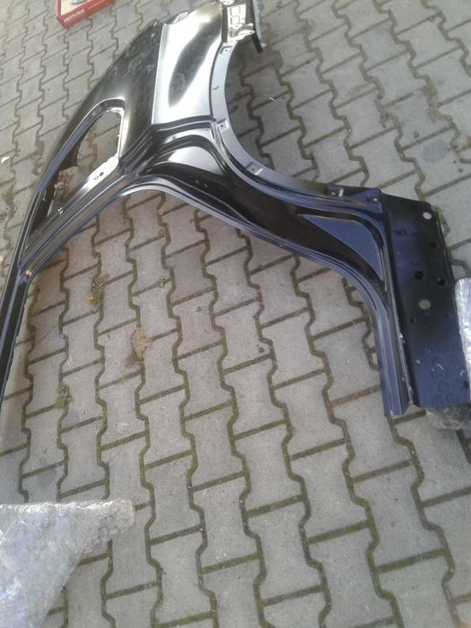 Nowy Błotnik Poszycie Błotnika Orginal BMW X5 E70 Lewy Tył Lewe Ćwiara