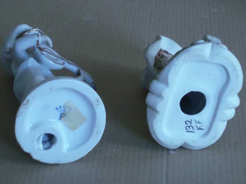 Par de crianças em porcelana