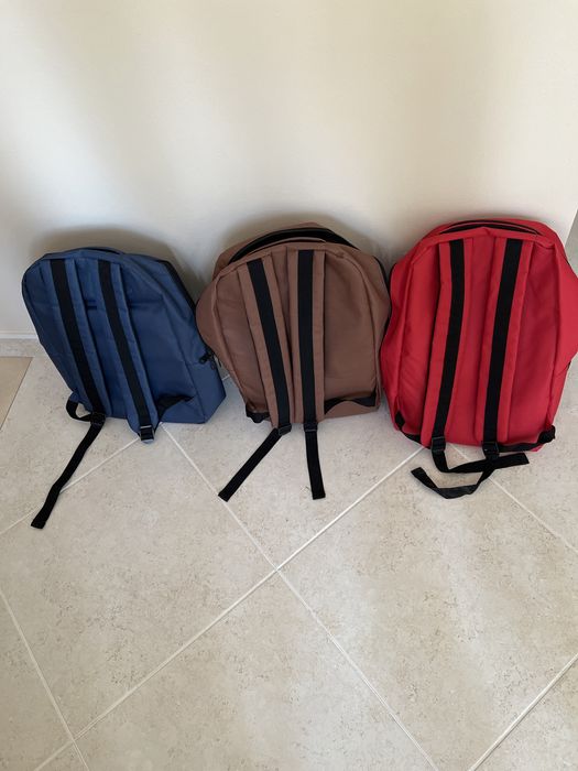 Mochilas castanho ,azul ou vermelha