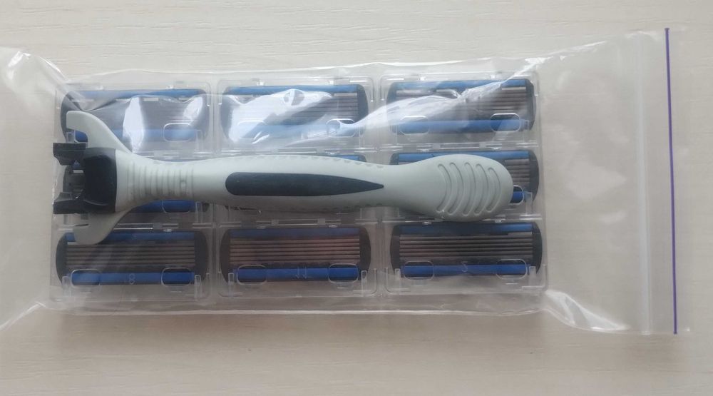 Бритва  с 9-ю сменными картриджами