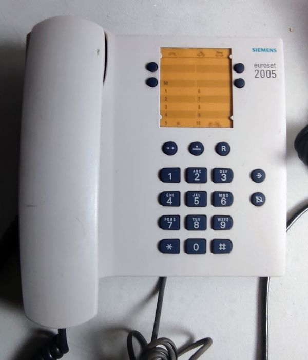 Telefones antigos - Ler anuncio