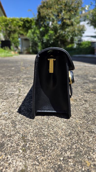 Mala coach em couro preto