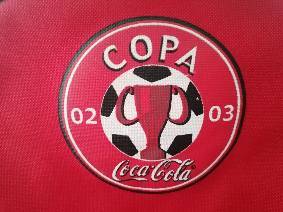 Mochila com publicidade da Coca-Cola aquando da Copa 2002 /2003.