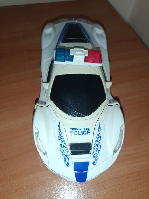 Іграшка поліцейська машина трансформер