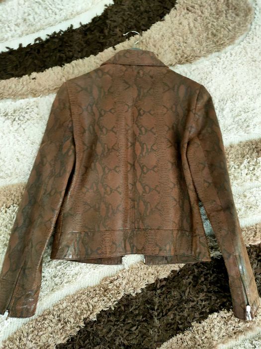 Casaco de couro castanho