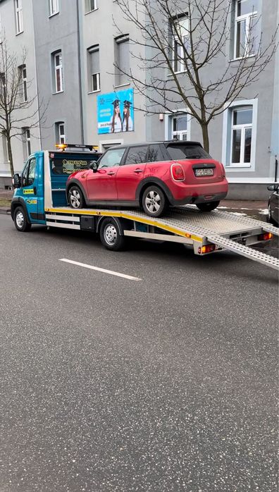 Pomoc Drogowa LECE Laweta Autolaweta Transport samochodów 24H