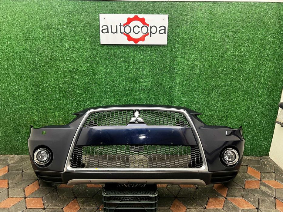 передній бампер Mitsubishi Outlender XL Rest 2010-1012