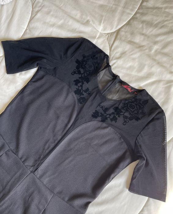 Macacão preto com transparência