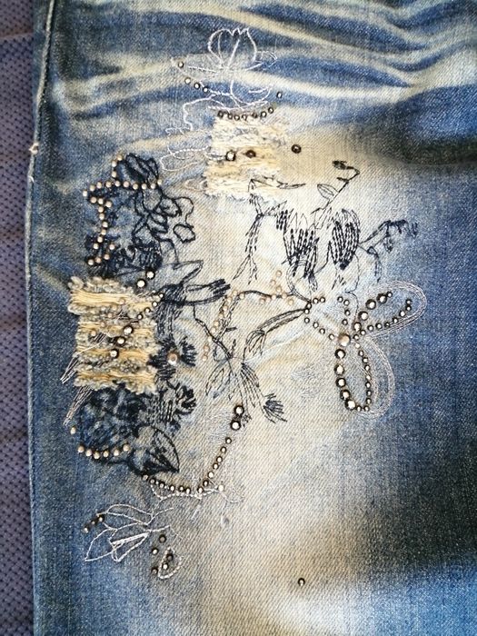 Nowe spodnie jeansy 40