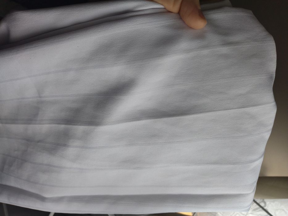 Białe spodnie damskie eleganckie