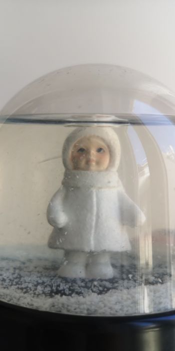 Globo de neve com criança