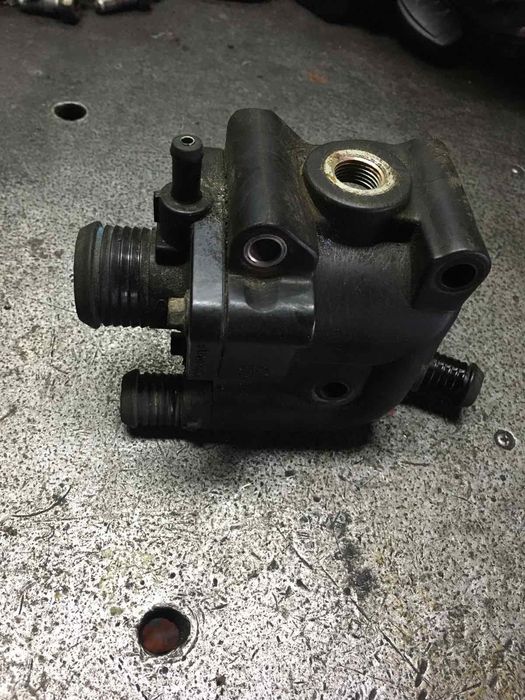 Корпус термостату Ford Mondeo 1,Mondeo 2,Focus1,Escort