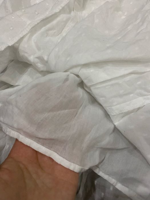 Біла спідниця вітнажний стиль