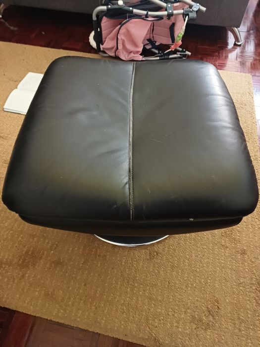 Apoio para pés giratório