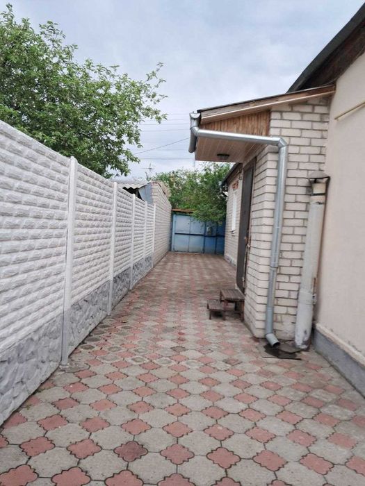 Продам 1/2 дома на Салтовке в районе парка Победы.