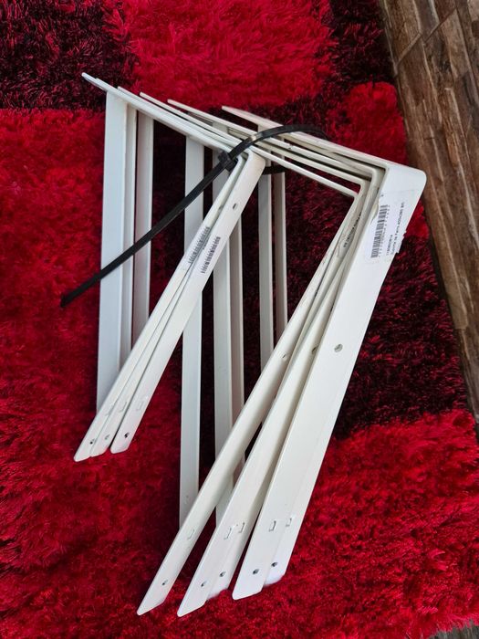 8 suportes  de ferro branco 20 euros