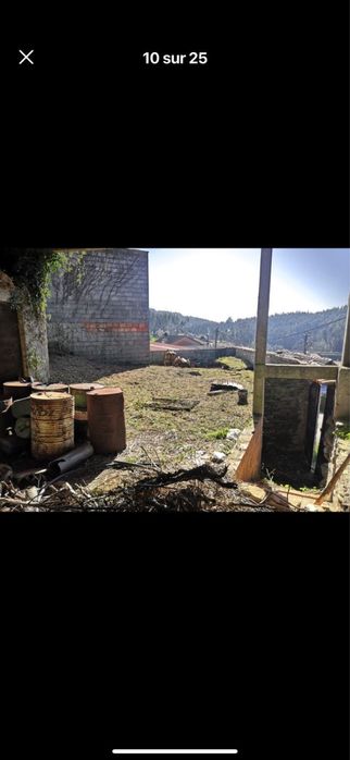 Casa com dependência e terreno