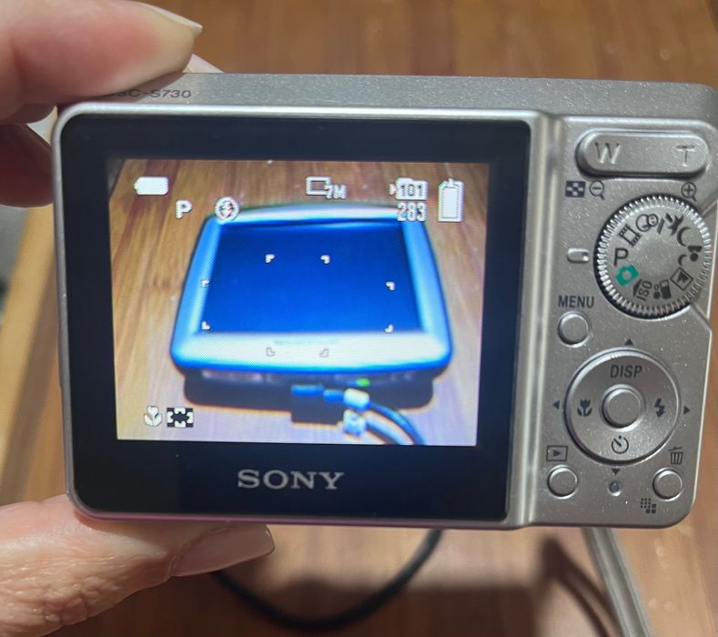 GPS tomtom e máquina fotográfica