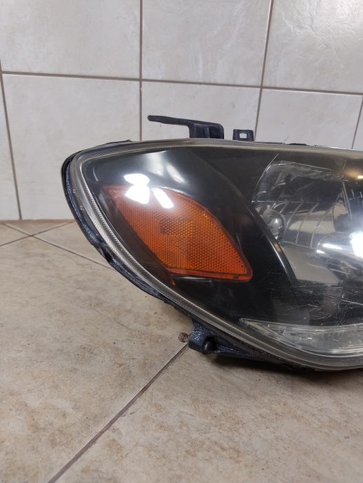 Mitsubishi Outlander I 1 lampa prawy przód Europa reflektor wysyłka