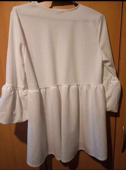 Elegancka białą tunika