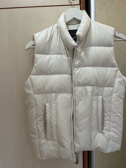 Жіноча осіння жилетка