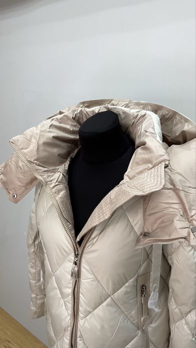 Жіночий пуховик ,є різні розміри CLASNA