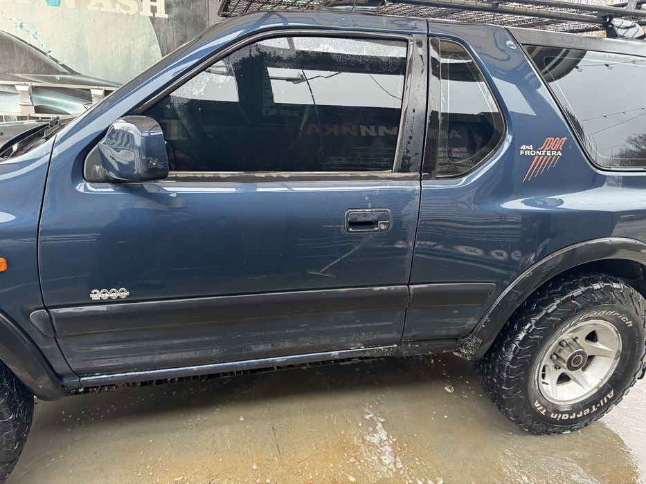 Опель фронтера б 2000 рік