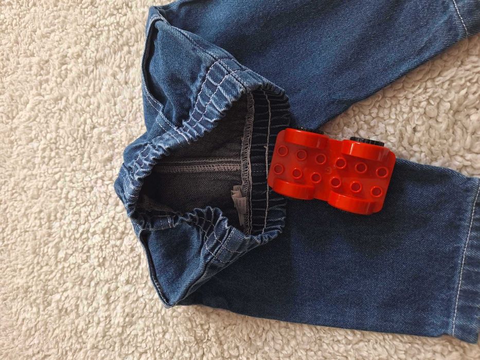 spodnie jeansowe: dla dzieci-bielone:z szeroką nogawką: like new