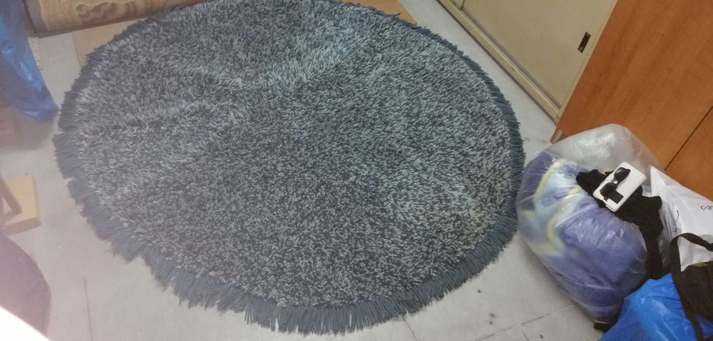 Carpete redonda..