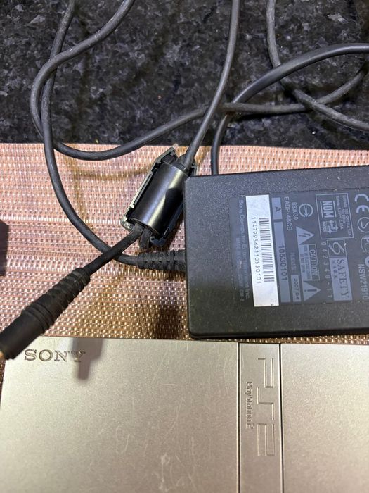 PlayStation 2 Slim Silver + comando