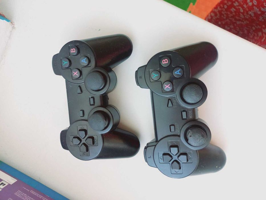 Продам Ігрову консоль б/у Game Stick Lite M8 64G 4K Ultra HD з двома джойстиками