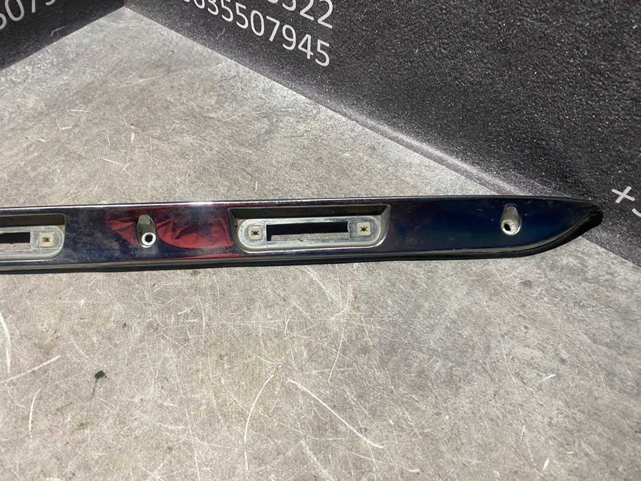 Планка бленда підсвітки номера з ущільнювачем Mercedes W124 1247580096