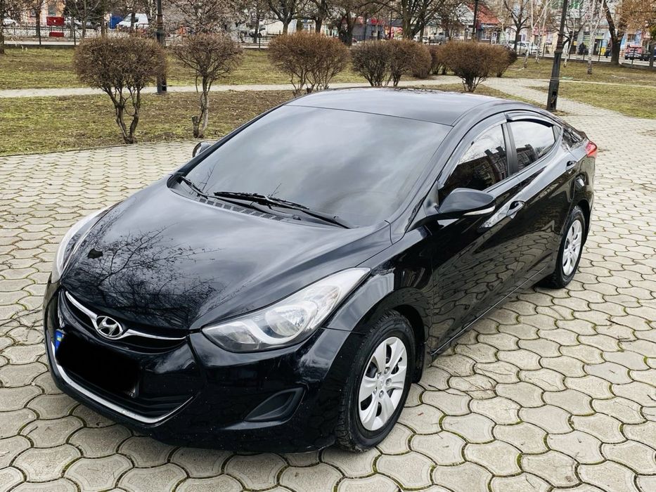 Hyundai Elantra 2013 год Газ/бензин