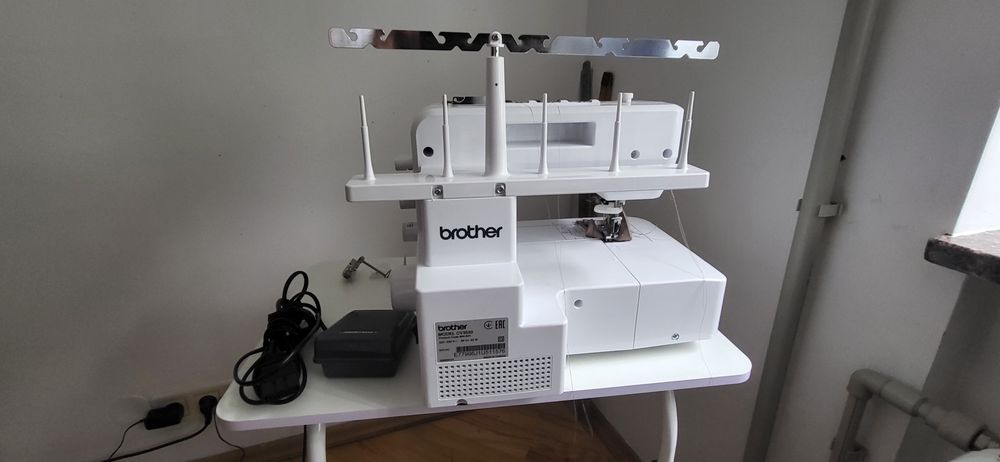 продам розпошивальну побутову машинку brather cover stitch cv 3550