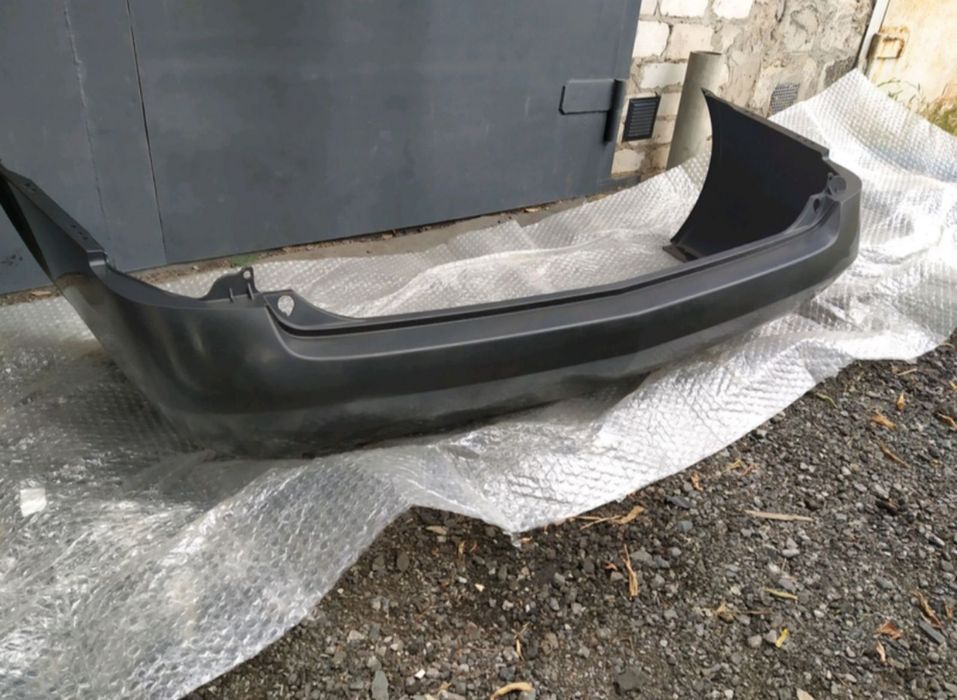 Бампер Ніссан прімера Р12 задній універсал