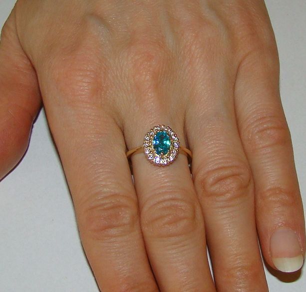 Złoty pierścionek 14karat z topazem.