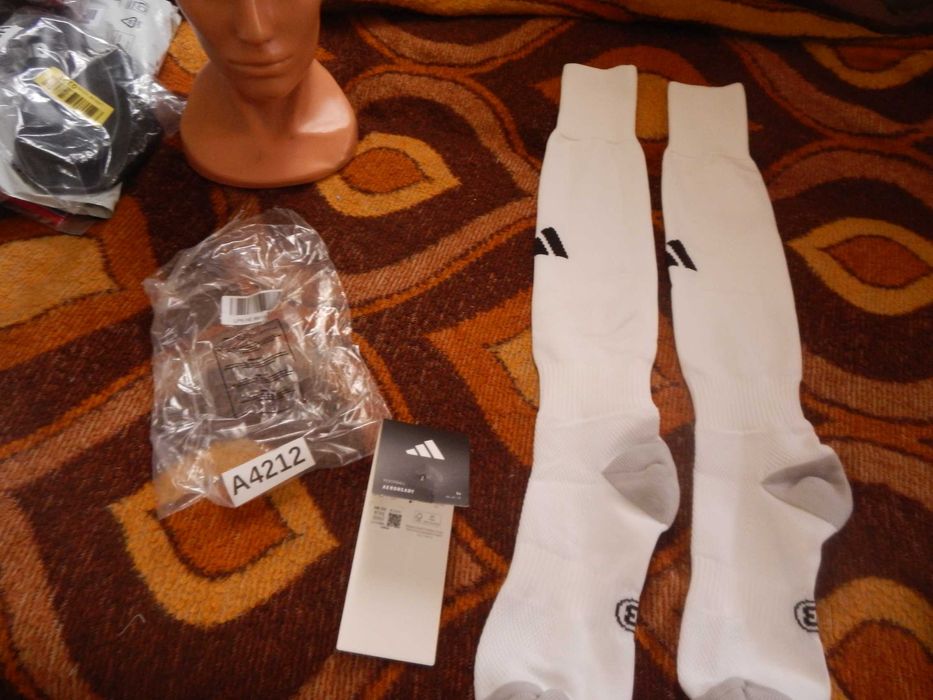 Wyprzedaż->A4212 Getry adidas Milano 23  rozm.. 40-42