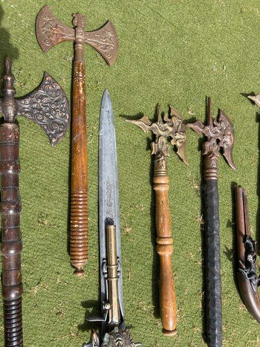 Box of replica artifacts including replica pistols
